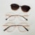 creme com dourado clip on animal print degrade