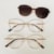 marrom com dourado clip on animal print