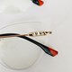 Armação de óculos de grau - Eloise 3 pontos cod 81027 - dourado ponteira preta detalhe laranja c8