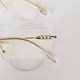 Armação de óculos de grau - Eloise 3 pontos cod 81027 - dourado ponteira transparente detalhe branco C1
