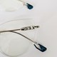 Armação de óculos de grau - Eloise 3 pontos cod 81027 - prata ponteira transparente detalhe azul c3
