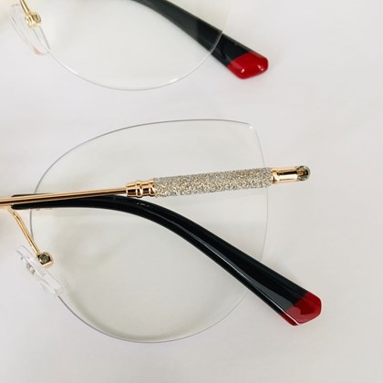 Armação de óculos de grau - Malévola 3 pontos cod 81075 - dourado ponteira preta detalhe vermelho C4
