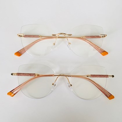 Armação de óculos de grau - Malévola 3 pontos cod 81075 - dourado ponteira transparente detalhe laranja C5