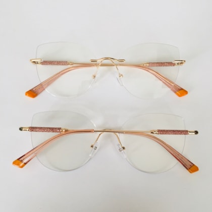 Armação de óculos de grau - Malévola 3 pontos cod 81075 - dourado ponteira transparente detalhe laranja C5 Armação de óculos de grau - Malévola 3 pontos cod 81075 - dourado ponteira transparente detalhe laranja C5