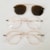 rose gold clip on lente marrom