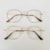marrom com dourado haste animal print