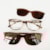 animal print lente marrom